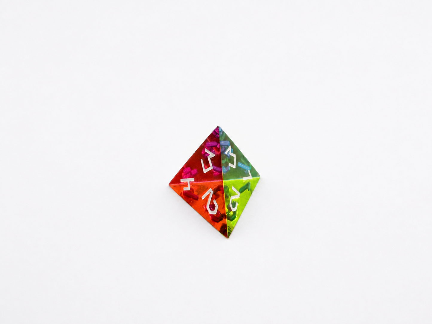 Translucent CMY Cubes four sided d4 die on a white background