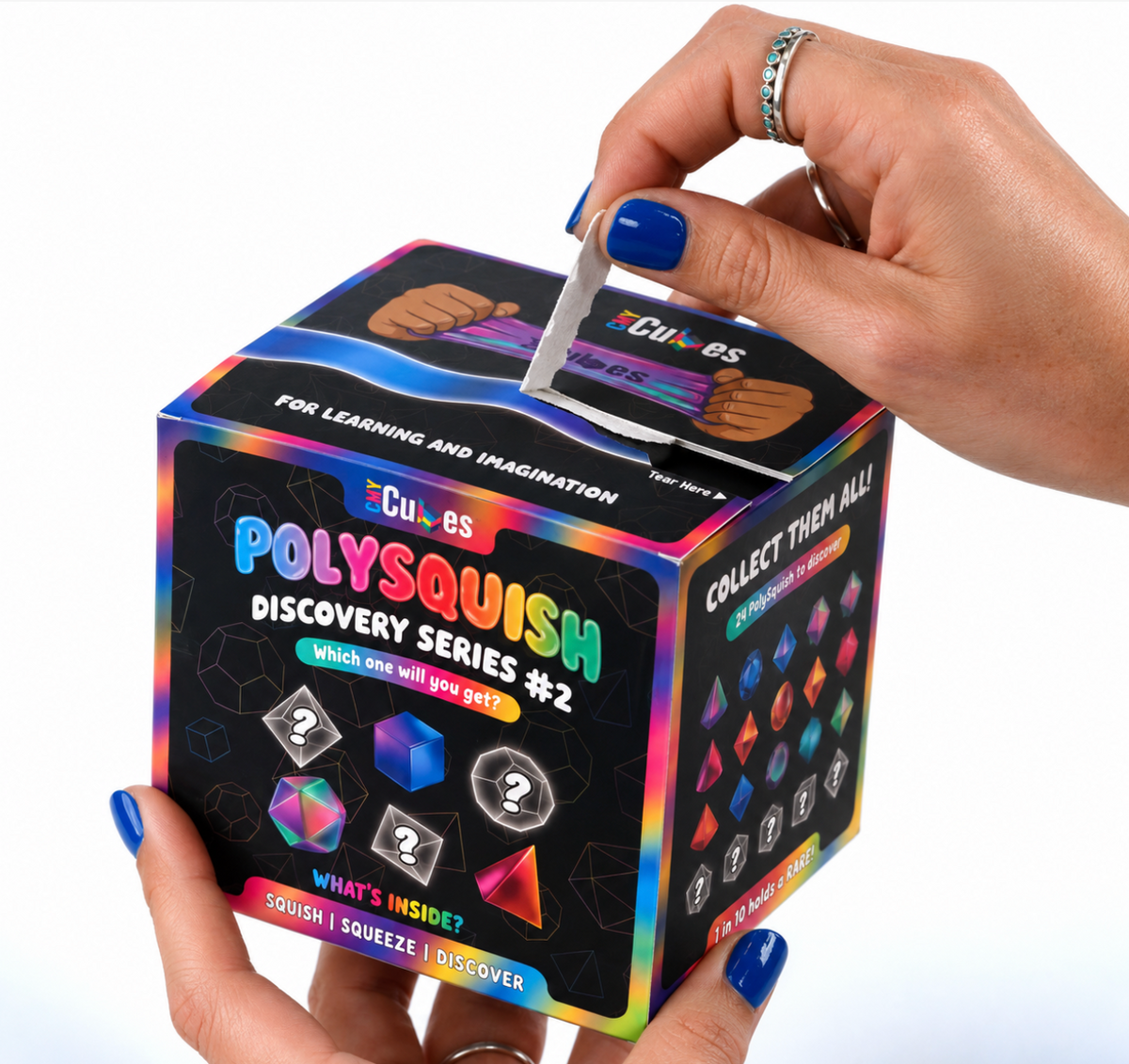 Hand opening the PolySquish Discovery Series #2 mystery box