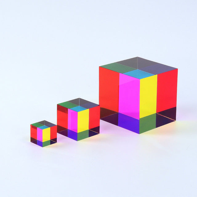 The Original CMY Cube, a translucent cyan, magenta and yellow cube